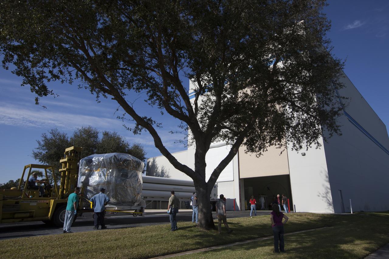 Two Magnetospheric Multiscale, or MMS, spacecraft comprising the mission’s upper stack are transported to the airlock of Building 1 of the Astrotech payload processing facility in Titusville, Florida, near Kennedy Space Center. The two MMS spacecraft comprising the lower stack arrived at Astrotech on Oct. 29. The Magnetospheric Multiscale mission is a Solar Terrestrial Probes mission comprising four identically instrumented spacecraft that will use Earth’s magnetosphere as a laboratory to study the microphysics of three fundamental plasma processes: magnetic reconnection, energetic particle acceleration and turbulence. Launch aboard a United Launch Alliance Atlas V rocket from Space Launch Complex 41 on Cape Canaveral Air Force Station is targeted for March 12, 2015.