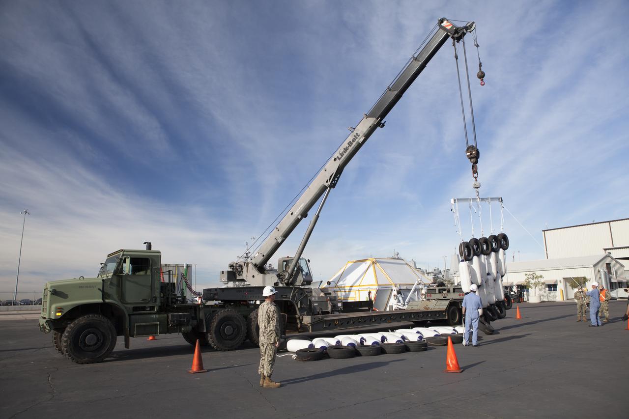 Ground support equipment for use during an alternate recovery method of the Orion crew module after its first flight test, if needed, is being prepared for loading onto the USNS Salvor, a salvage ship, at Naval Base San Diego in California. Before launch of Orion on a Delta IV Heavy rocket from Cape Canaveral Air Force Station in Florida, NASA, Lockheed Martin and U.S. Navy personnel will head out to sea in the USS Anchorage and the USNS Salvor and wait for splashdown of the Orion crew module in the Pacific Ocean. The GSDO Program will lead the recovery efforts. Orion is the exploration spacecraft designed to carry astronauts to destinations not yet explored by humans, including an asteroid and Mars. It will have emergency abort capability, sustain the crew during space travel and provide safe re-entry from deep space return velocities. The first unpiloted flight test of Orion is scheduled to launch in December atop a United Launch Alliance Delta IV Heavy rocket and in 2018 on NASA’s Space Launch System rocket. 
