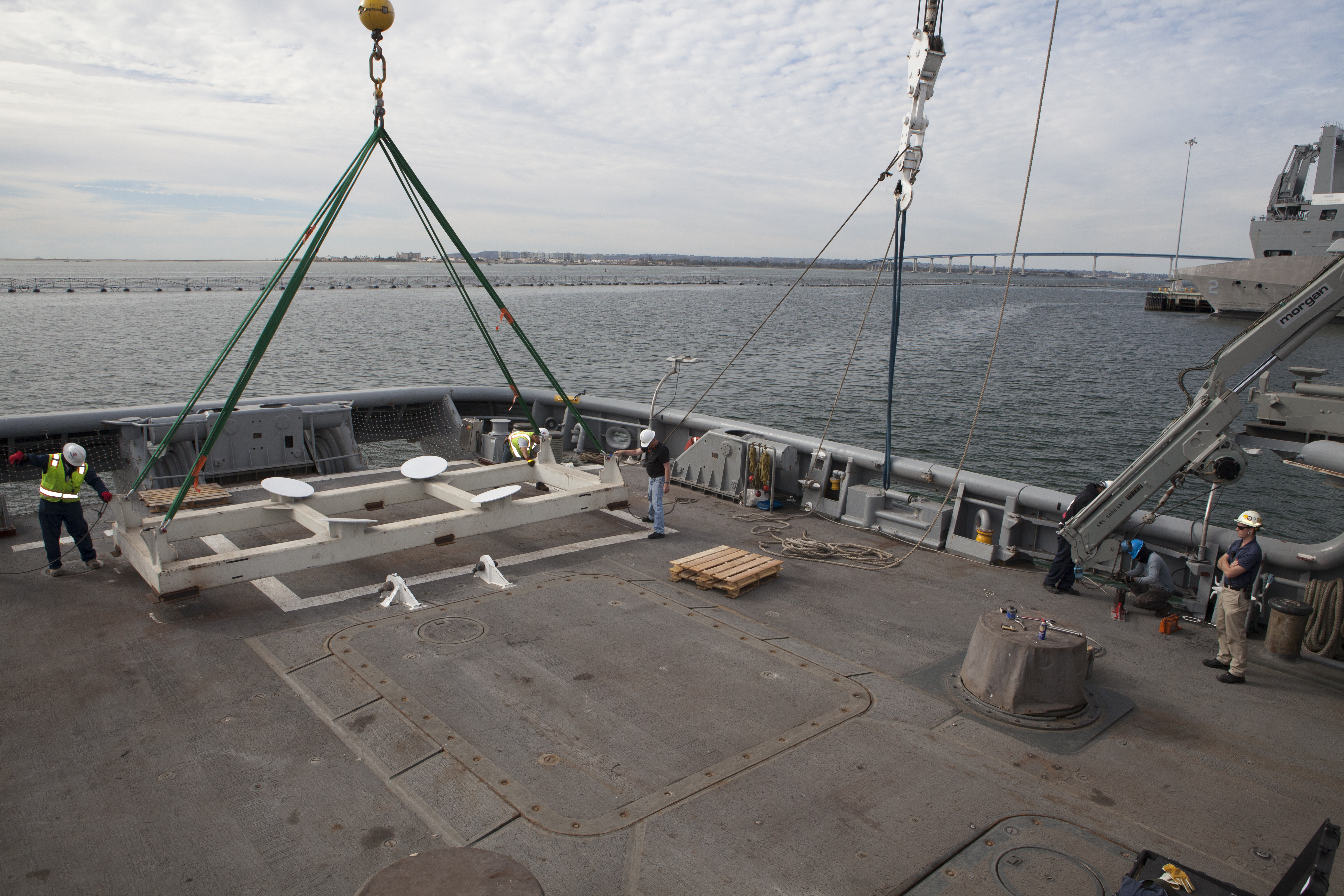 Ground support equipment for use during an alternate recovery method of the Orion crew module after its first flight test, if needed, is secured on the deck of the USNS Salvor, a salvage ship, at Naval Base San Diego in California. Before launch of Orion on a Delta IV Heavy rocket from Cape Canaveral Air Force Station in Florida, NASA, Lockheed Martin and U.S. Navy personnel will head out to sea in the USS Anchorage and the USNS Salvor and wait for splashdown of the Orion crew module in the Pacific Ocean. The GSDO Program will lead the recovery efforts. Orion is the exploration spacecraft designed to carry astronauts to destinations not yet explored by humans, including an asteroid and Mars. It will have emergency abort capability, sustain the crew during space travel and provide safe re-entry from deep space return velocities. The first unpiloted flight test of Orion is scheduled to launch in December atop a United Launch Alliance Delta IV Heavy rocket and in 2018 on NASA’s Space Launch System rocket. 