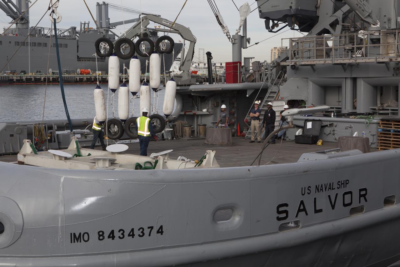 Ground support equipment for use during an alternate recovery method of the Orion crew module after its first flight test, if needed, is lowered by crane onto the deck of the USNS Salvor, a salvage ship, at Naval Base San Diego in California. Before launch of Orion on a Delta IV Heavy rocket from Cape Canaveral Air Force Station in Florida, NASA, Lockheed Martin and U.S. Navy personnel will head out to sea in the USS Anchorage and the USNS Salvor and wait for splashdown of the Orion crew module in the Pacific Ocean. The GSDO Program will lead the recovery efforts. Orion is the exploration spacecraft designed to carry astronauts to destinations not yet explored by humans, including an asteroid and Mars. It will have emergency abort capability, sustain the crew during space travel and provide safe re-entry from deep space return velocities. The first unpiloted flight test of Orion is scheduled to launch in December atop a United Launch Alliance Delta IV Heavy rocket and in 2018 on NASA’s Space Launch System rocket. 