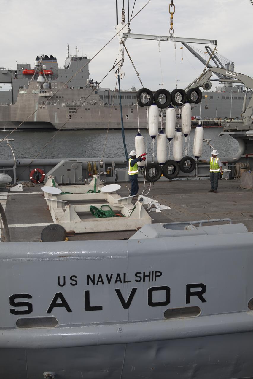 Ground support equipment for use during an alternate recovery method of the Orion crew module after its first flight test, if needed, is lowered by crane onto the deck of the USNS Salvor, a salvage ship, at Naval Base San Diego in California. Before launch of Orion on a Delta IV Heavy rocket from Cape Canaveral Air Force Station in Florida, NASA, Lockheed Martin and U.S. Navy personnel will head out to sea in the USS Anchorage and the USNS Salvor and wait for splashdown of the Orion crew module in the Pacific Ocean. The GSDO Program will lead the recovery efforts. Orion is the exploration spacecraft designed to carry astronauts to destinations not yet explored by humans, including an asteroid and Mars. It will have emergency abort capability, sustain the crew during space travel and provide safe re-entry from deep space return velocities. The first unpiloted flight test of Orion is scheduled to launch in December atop a United Launch Alliance Delta IV Heavy rocket and in 2018 on NASA’s Space Launch System rocket.