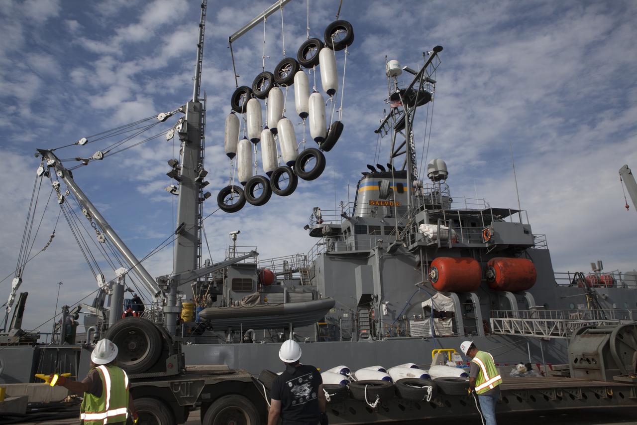 Ground support equipment for use during an alternate recovery method of the Orion crew module after its first flight test, if needed, is lowered by crane onto the deck of the USNS Salvor, a salvage ship, at Naval Base San Diego in California. Before launch of Orion on a Delta IV Heavy rocket from Cape Canaveral Air Force Station in Florida, NASA, Lockheed Martin and U.S. Navy personnel will head out to sea in the USS Anchorage and the USNS Salvor and wait for splashdown of the Orion crew module in the Pacific Ocean. The GSDO Program will lead the recovery efforts. Orion is the exploration spacecraft designed to carry astronauts to destinations not yet explored by humans, including an asteroid and Mars. It will have emergency abort capability, sustain the crew during space travel and provide safe re-entry from deep space return velocities. The first unpiloted flight test of Orion is scheduled to launch in December atop a United Launch Alliance Delta IV Heavy rocket and in 2018 on NASA’s Space Launch System rocket.