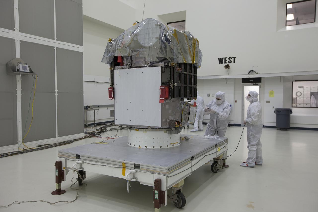 NOAA’s Deep Space Climate Observatory spacecraft, or DSCOVR, has been uncovered and is ready for processing in the high bay of Building 1 at the Astrotech payload processing facility in Titusville, Florida, near Kennedy Space Center. DSCOVR is a partnership between NOAA, NASA and the U.S. Air Force. DSCOVR will maintain the nation's real-time solar wind monitoring capabilities which are critical to the accuracy and lead time of NOAA's space weather alerts and forecasts. Launch is currently scheduled for January 2015 aboard a SpaceX Falcon 9 v 1.1 launch vehicle from Cape Canaveral Air Force Station, Florida. 