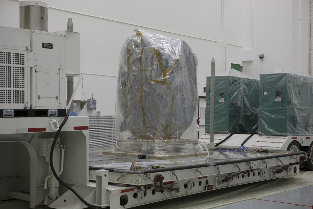 Preparations are underway to lift NOAA’s Deep Space Climate Observatory spacecraft, or DSCOVR, wrapped in plastic, from its transportation pallet at the Astrotech payload processing facility in Titusville, Florida, near Kennedy Space Center. DSCOVR is a partnership between NOAA, NASA and the U.S. Air Force. DSCOVR will maintain the nation's real-time solar wind monitoring capabilities which are critical to the accuracy and lead time of NOAA's space weather alerts and forecasts. Launch is currently scheduled for January 2015 aboard a SpaceX Falcon 9 v 1.1 launch vehicle from Cape Canaveral Air Force Station, Florida.