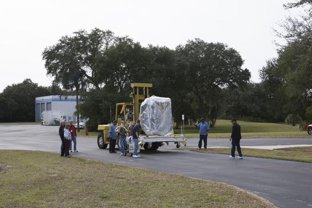 NASA image: DSCOVR Spacecraft Arrival, Offload, & Unpacking