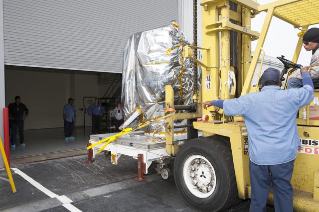 NASA image: DSCOVR Spacecraft Arrival, Offload, & Unpacking