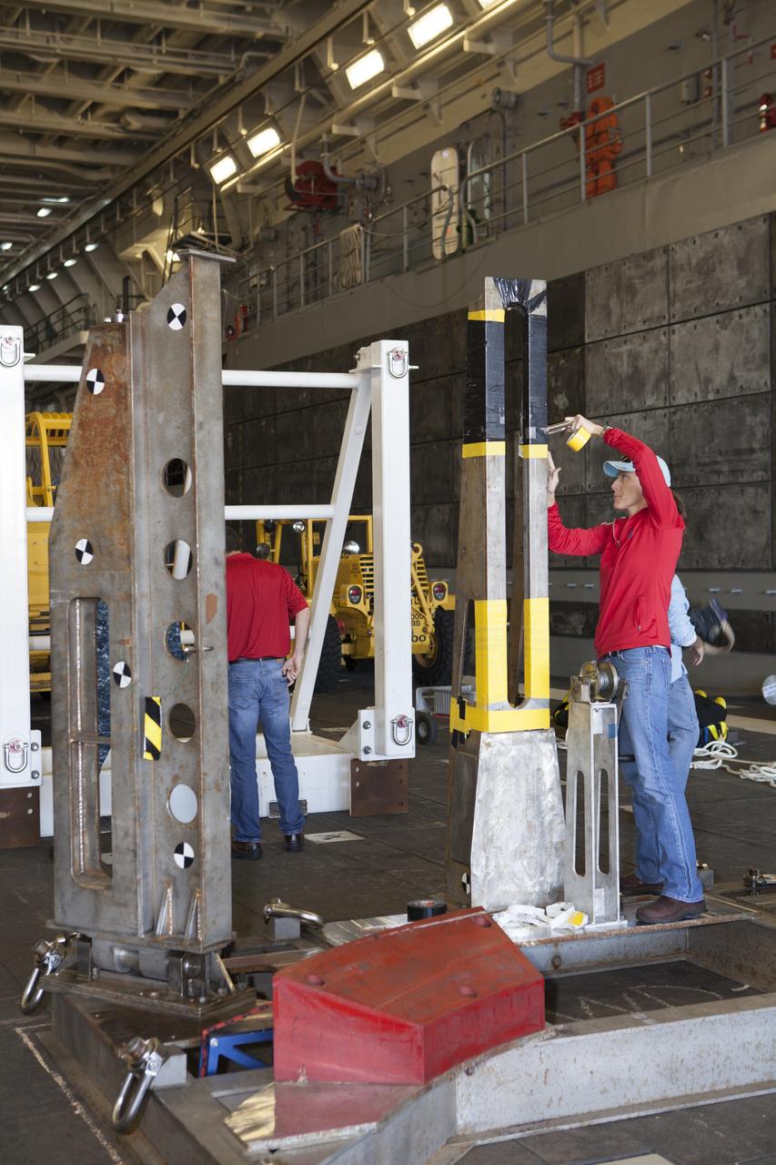 Ground support equipment is being secured in the well deck of the USS Anchorage at Naval Base San Diego in California. The equipment will be used during recovery of the Orion crew module after its first flight test. Before launch of Orion on a Delta IV Heavy rocket from Cape Canaveral Air Force Station in Florida, NASA, Lockheed Martin and U.S. Navy personnel will head out to sea in the USS Anchorage and the USNS Salvor, a salvage ship, and wait for splashdown of the Orion crew module in the Pacific Ocean. The Ground Systems Development and Operations Program will lead the recovery efforts. Orion is the exploration spacecraft designed to carry astronauts to destinations not yet explored by humans, including an asteroid and Mars. It will have emergency abort capability, sustain the crew during space travel and provide safe re-entry from deep space return velocities. The first unpiloted flight test of Orion is scheduled to launch in December atop a United Launch Alliance Delta IV Heavy rocket and in 2018 on NASA’s Space Launch System rocket.