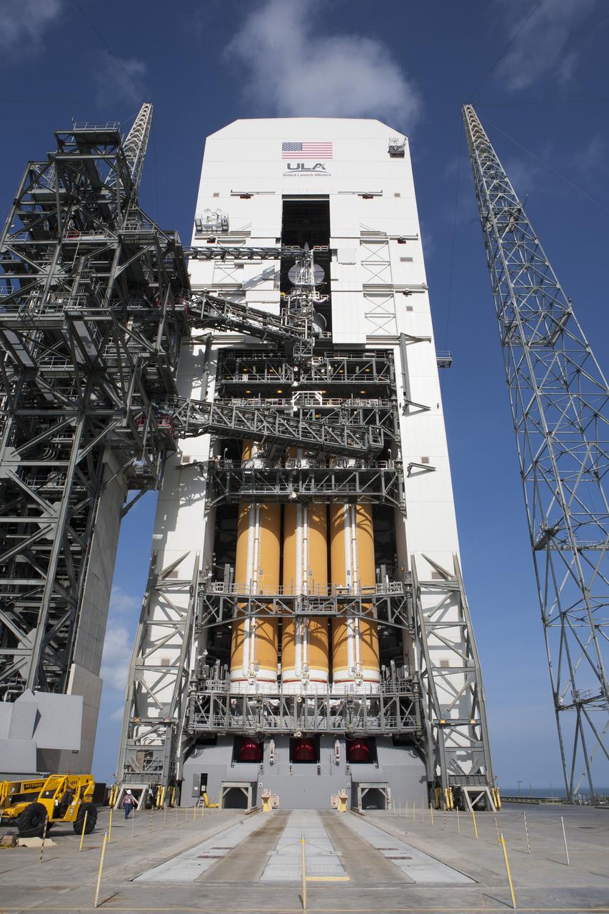 With access doors at Space Launch Complex 37 opened, the Orion and Delta IV Heavy stack is visible in its entirety inside the Mobile Service Tower where the vehicle is undergoing launch preparations. Orion will make its first flight test on Dec. 4 with a morning launch atop the United Launch Alliance Delta IV Heavy. The spacecraft will orbit the Earth twice, including one loop that will reach 3,600 miles above Earth. No one will be aboard Orion for this flight test, but the spacecraft is being designed and built to carry astronauts to deep space destinations such as an asteroid.