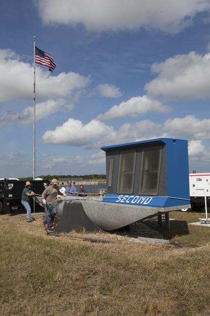 NASA image: The Historical Time Clock is Dismantled from the Press Site