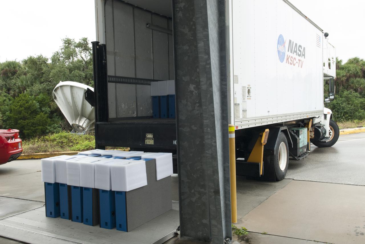 At NASA's Kennedy Space Center in Florida, the first of 24 light emitting diode LED panels have arrived for installation in the new countdown clock at the spaceport's Press Site. A new modern, multimedia display soon will be installed, similar to the screens seen at sporting venues. The new screen will be nearly 26 feet wide by 7 feet high, a foot taller than the original clock. The historic countdown clock was designed by Kennedy engineers and built by space center technicians before Apollo 12 in 1969. NASA has requested to acquire the countdown clock from the agency’s Artifact Working Group at the agency's Headquarters for likely display at the Kennedy Space Center Visitor Complex.