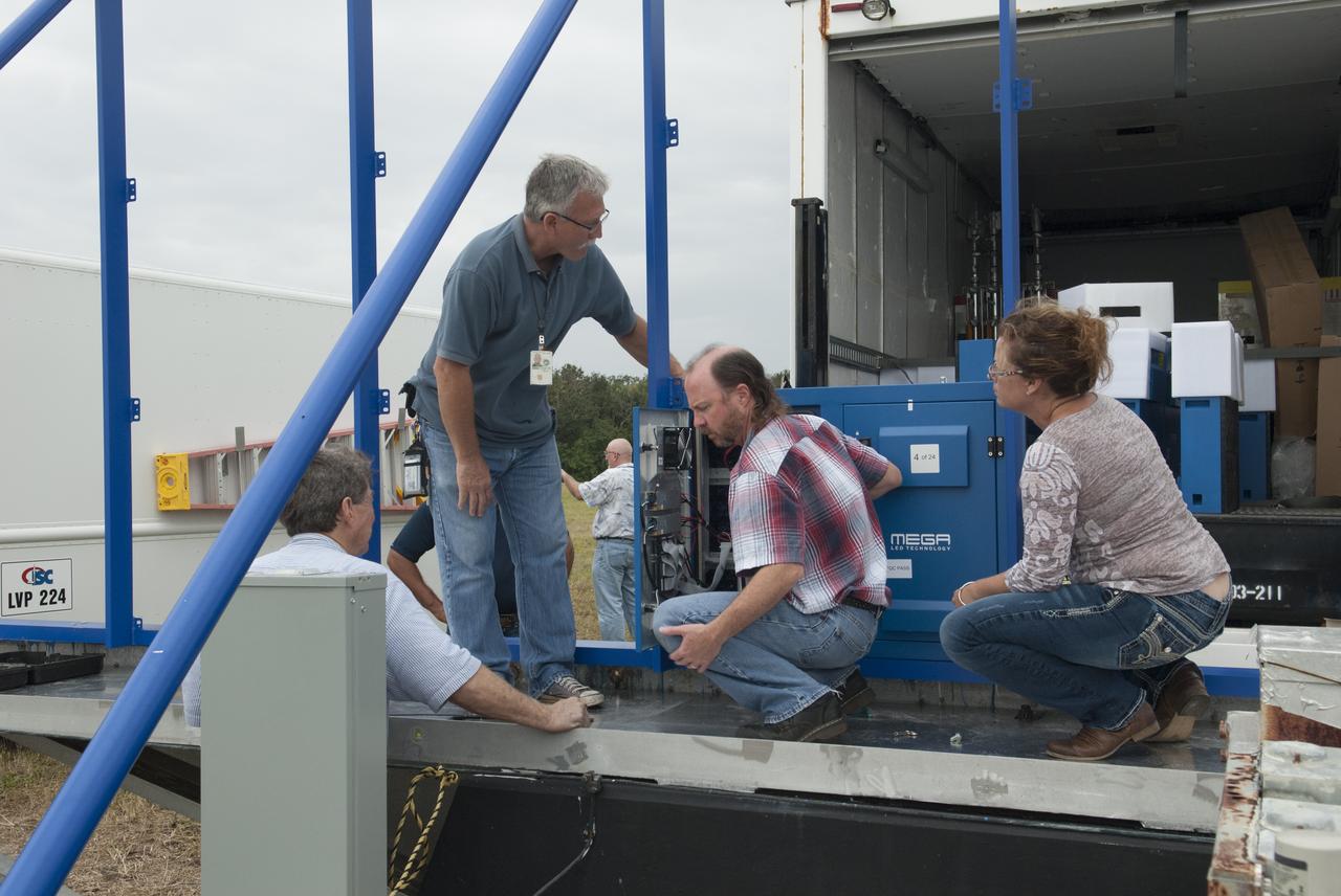 At NASA's Kennedy Space Center in Florida, assembly has begun on the first of 24 light emitting diode LED panels for installation in the new countdown clock at the spaceport's Press Site. The new modern, multimedia display will be similar to the screens seen at sporting venues. The new screen will be nearly 26 feet wide by 7 feet high, a foot taller than the original clock. The historic countdown clock was designed by Kennedy engineers and built by space center technicians before Apollo 12 in 1969. NASA has requested to acquire the countdown clock from the agency’s Artifact Working Group at the agency's Headquarters for likely display at the Kennedy Space Center Visitor Complex.