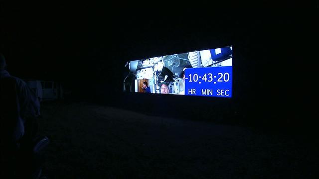 At NASA's Kennedy Space Center in Florida, the new countdown clock at the spaceport's Press Site is being tested. The modern, multimedia display is similar to the screens seen at sporting venues. The new screen will be nearly 26 feet wide by 7 feet high, a foot taller than the original clock. The historic countdown clock was designed by Kennedy engineers and built by space center technicians before Apollo 12 in 1969. NASA has requested to acquire the countdown clock from the agency’s Artifact Working Group at the agency's Headquarters for display at the Kennedy Space Center Visitor Complex. 