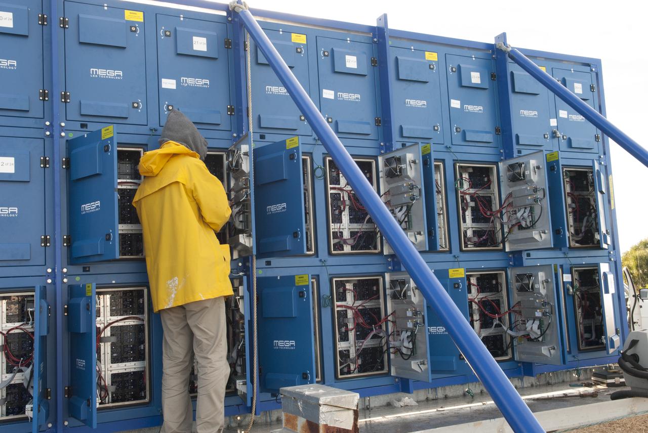 At NASA's Kennedy Space Center in Florida, work continues to install 24 light emitting diode LED panels in the new countdown clock at the spaceport's Press Site. The modern, multimedia display is similar to the screens seen at sporting venues. The new screen will be nearly 26 feet wide by 7 feet high, a foot taller than the original clock. The historic countdown clock was designed by Kennedy engineers and built by space center technicians before Apollo 12 in 1969. NASA has requested to acquire the countdown clock from the agency’s Artifact Working Group at the agency's Headquarters for display at the Kennedy Space Center Visitor Complex.