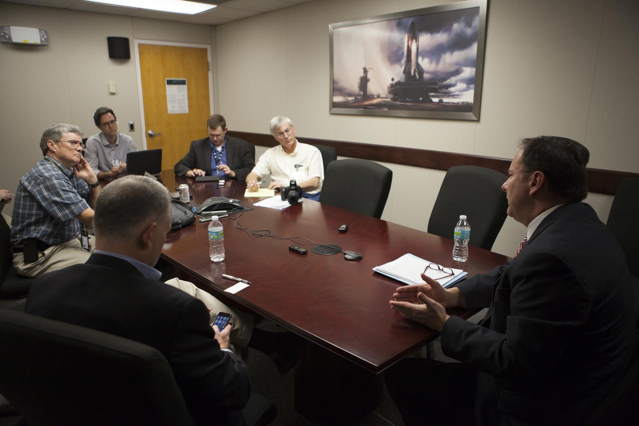 Journalists listen as NASA Associate Administrator Robert Lightfoot provides information on the Asteroid Redirect Mission during a roundtable discussion at the agency's Kennedy Space Center in Florida. 