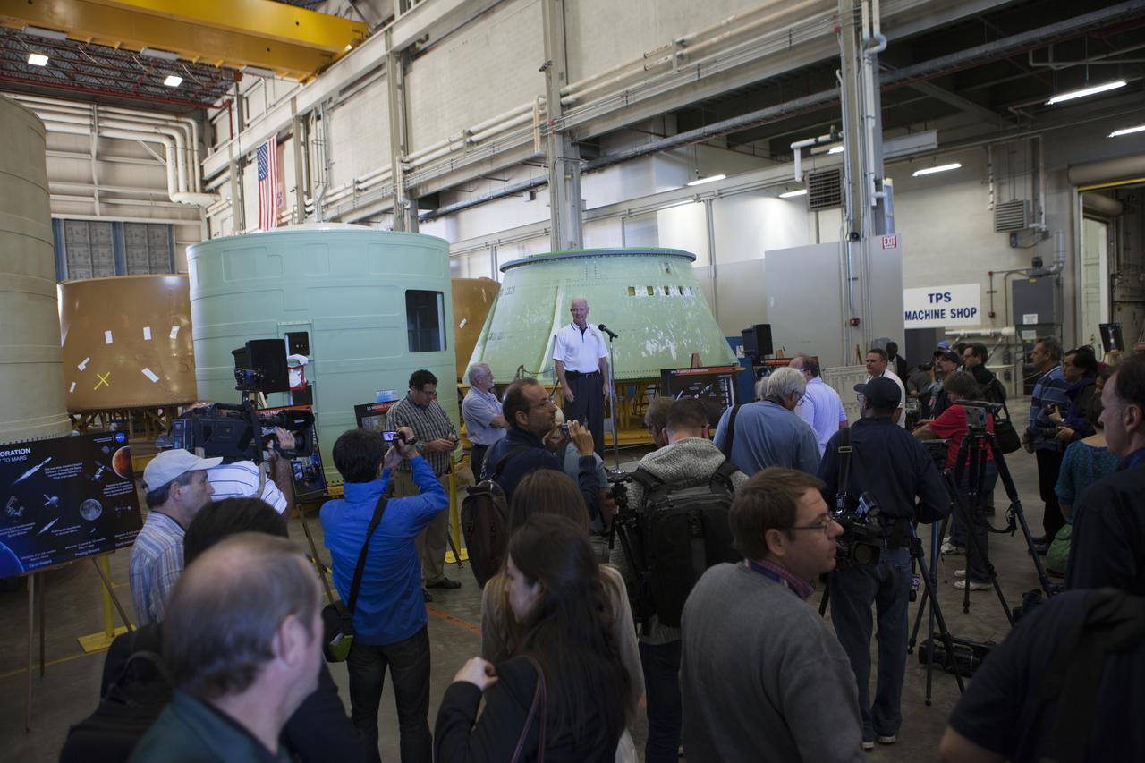At NASA's Kennedy Space Center in Florida, members of the news media are briefed on the agency's Space Launch System SLS Program by former astronaut Brian Duffy who is now vice president and program manager of Exploration Systems at Alliant Techsystems Inc. ATK. The briefing took place in the spaceport's Booster Fabrication Facility BFF. During the Space Shuttle Program, the facility was used for processing forward segments and aft skirts for the solid rocket boosters. The BFF will serve a similar role for the SLS. Orion is the exploration spacecraft designed to carry astronauts to destinations not yet explored by humans, including an asteroid and Mars. It will have emergency abort capability, sustain the crew during space travel and provide safe re-entry from deep space return velocities. The first unpiloted flight test of Orion is scheduled to launch Dec. 4, 2014 atop a United Launch Alliance Delta IV Heavy rocket, and in 2018 on NASA’s Space Launch System rocket. 