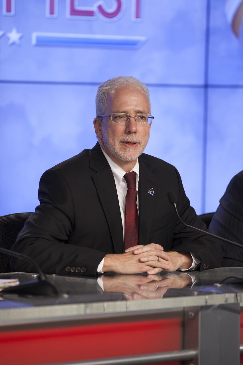 In the Kennedy Space Center’s Press Site auditorium, Mark Geyer, Orion program manager, was among agency and industry leaders who spoke to members of the news media as the Orion spacecraft and its Delta IV Heavy rocket were being prepared for launch. Orion is the exploration spacecraft designed to carry astronauts to destinations not yet explored by humans, including an asteroid and Mars. It will have emergency abort capability, sustain the crew during space travel and provide safe re-entry from deep space return velocities. The first unpiloted flight test of Orion is scheduled to launch Dec. 4, 2014 atop a United Launch Alliance Delta IV Heavy rocket, and in 2018 on NASA’s Space Launch System rocket.