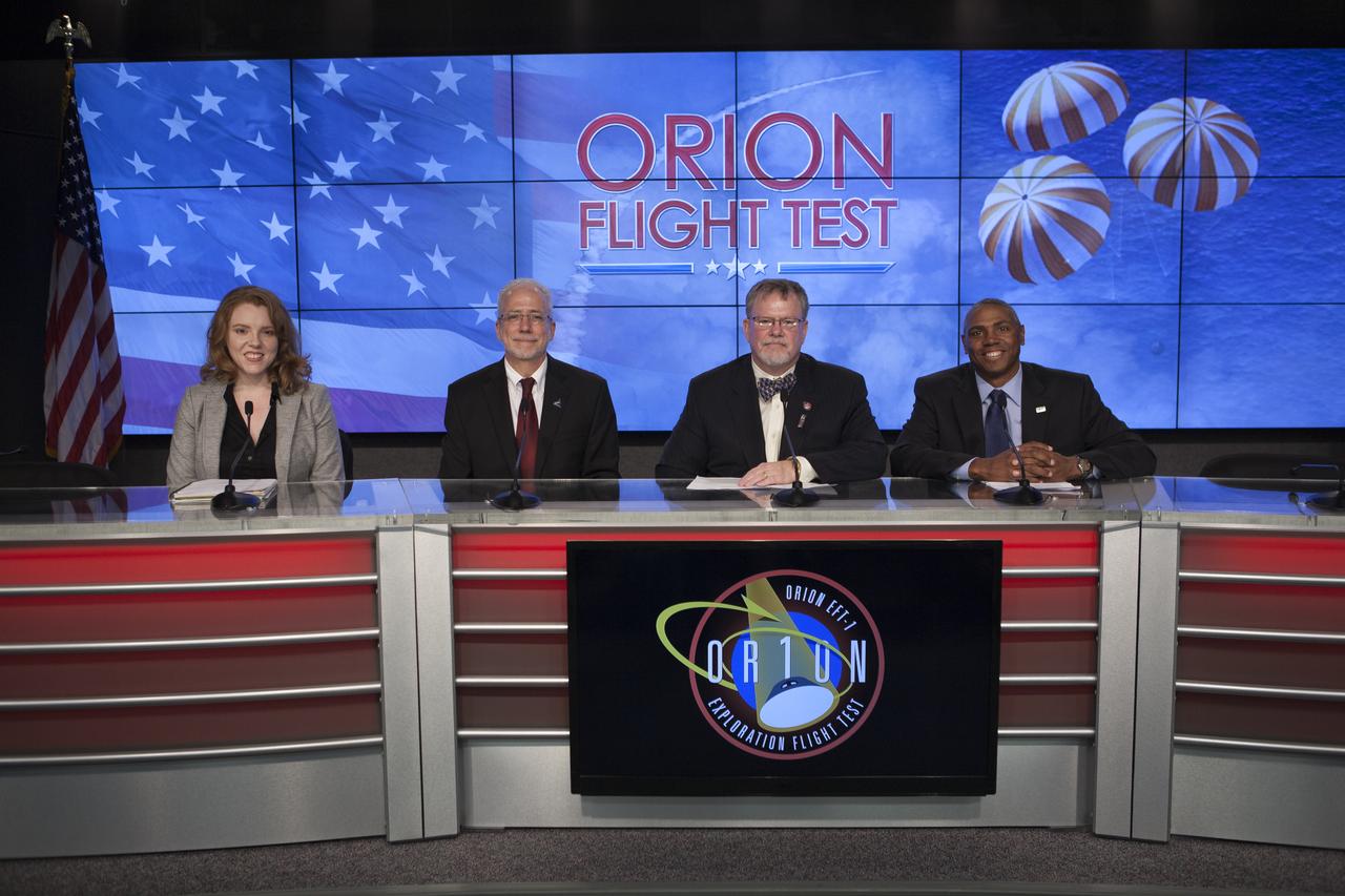 In the Kennedy Space Center’s Press Site auditorium, agency and industry leaders spoke to members of the news media as the Orion spacecraft and its Delta IV Heavy rocket were being prepared for launch. From left are: Brandi Dean of NASA Public Affairs, Mark Geyer, Orion program manager, Mike Hawes, Lockheed Martin Orion Program manager, and Ron Fortson, United Launch Alliance director of mission management. Orion is the exploration spacecraft designed to carry astronauts to destinations not yet explored by humans, including an asteroid and Mars. It will have emergency abort capability, sustain the crew during space travel and provide safe re-entry from deep space return velocities. The first unpiloted flight test of Orion is scheduled to launch Dec. 4, 2014 atop a United Launch Alliance Delta IV Heavy rocket, and in 2018 on NASA’s Space Launch System rocket.