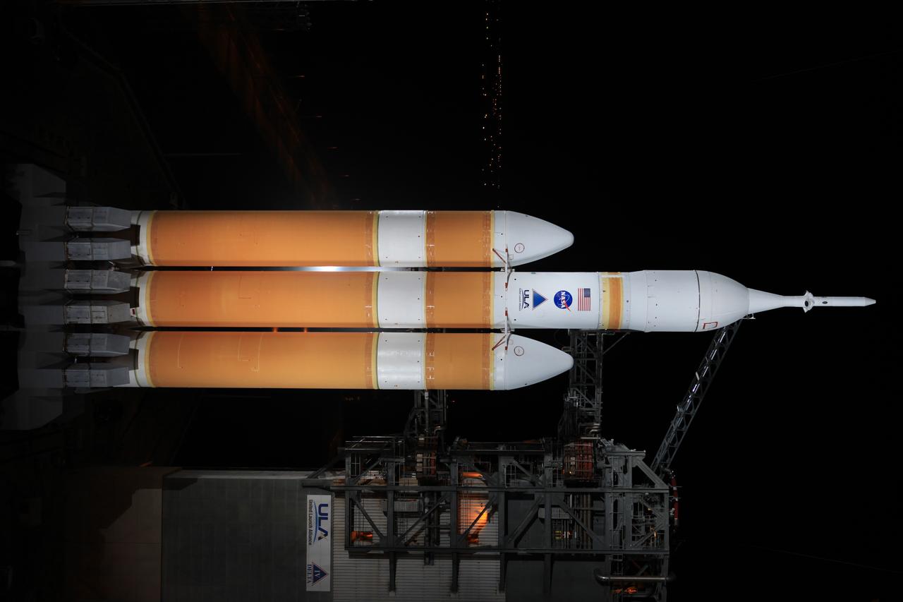 The launch gantry is rolled back to reveal NASA's Orion spacecraft mounted atop a United Launch Alliance Delta IV Heavy rocket at Cape Canaveral Air Force Station's Space Launch Complex 37. Orion is NASA’s new spacecraft built to carry humans, designed to allow us to journey to destinations never before visited by humans, including an asteroid and Mars.
