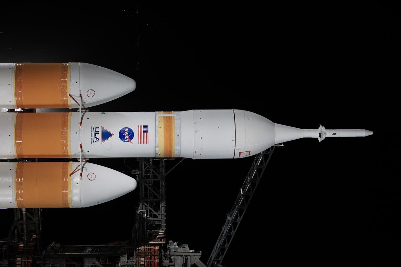 The launch gantry is rolled back to reveal NASA's Orion spacecraft mounted atop a United Launch Alliance Delta IV Heavy rocket at Cape Canaveral Air Force Station's Space Launch Complex 37. Orion is NASA’s new spacecraft built to carry humans, designed to allow us to journey to destinations never before visited by humans, including an asteroid and Mars.