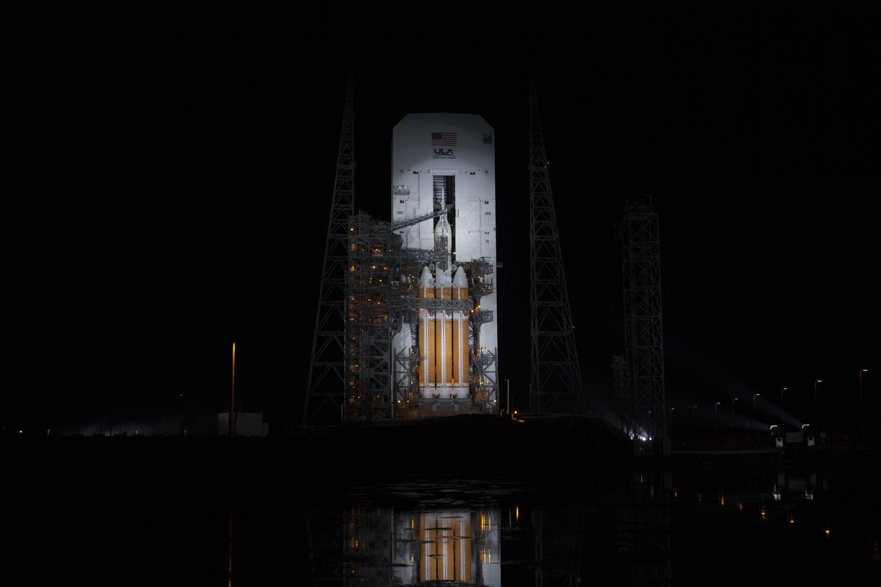 The launch gantry is rolled back to reveal NASA's Orion spacecraft mounted atop a United Launch Alliance Delta IV Heavy rocket at Cape Canaveral Air Force Station's Space Launch Complex 37. Orion is NASA’s new spacecraft built to carry humans, designed to allow us to journey to destinations never before visited by humans, including an asteroid and Mars.