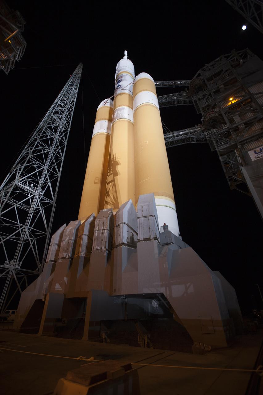 The launch gantry is rolled back to reveal NASA's Orion spacecraft mounted atop a United Launch Alliance Delta IV Heavy rocket at Cape Canaveral Air Force Station's Space Launch Complex 37. Orion is NASA’s new spacecraft built to carry humans, designed to allow us to journey to destinations never before visited by humans, including an asteroid and Mars.