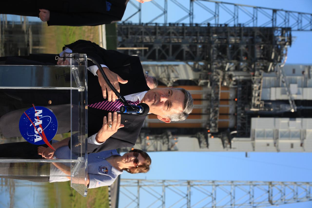 At Cape Canaveral Air Force Station's Launch Complex 37, Kennedy Space Center Director Bob Cabana speaks to members of the news media as the Orion spacecraft and its United Launch Alliance Delta IV Heavy rocket were being prepared for launch. On the right, behind Cabana is Johnson Space Center Director Ellen Ochoa.