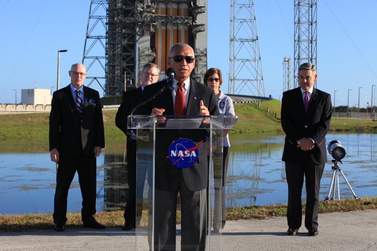 At Cape Canaveral Air Force Station's Launch Complex 37, NASA Administrator Charlie Bolden speaks to members of the news media as the Orion spacecraft and its United Launch Alliance Delta IV Heavy rocket were being prepared for launch. Behind Bolden, from the left, are United Launch Alliance CEO Tory Bruno, Lockheed Martin Orion Program Manager Mike Hawes, Johnson Space Center Director Ellen Ochoa and Kennedy Space Center Director Bob Cabana.