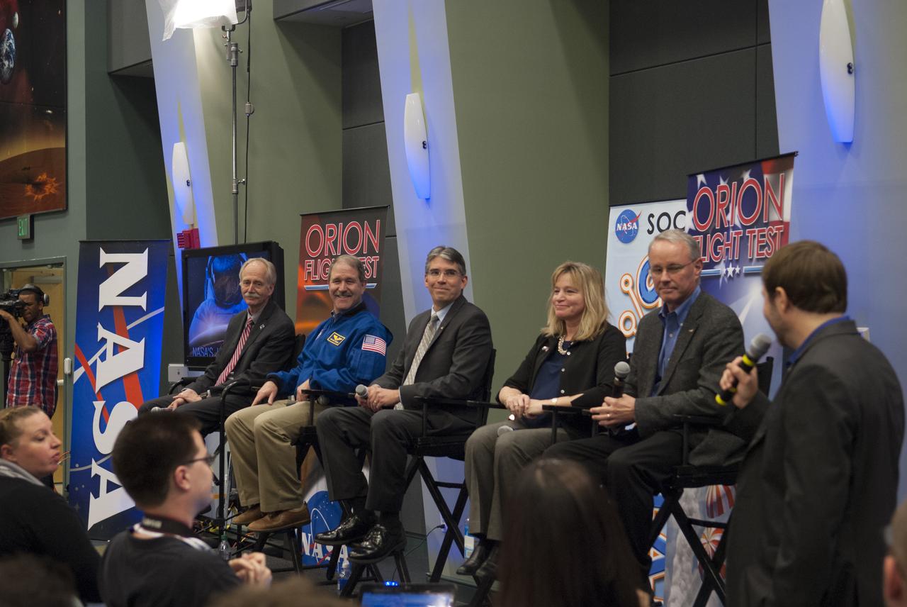 At NASA's Kennedy Space Center in Florida, NASA leaders spoke to social media participants as the Orion spacecraft and its Delta IV Heavy rocket were being prepared for launch. Speakers included, from the left, NASA Associate Administrator Human Exploration and Operations Bill Gerstenmaier, Associate Administrator for the agency's Science Mission Directorate John Grunsfeld, Associate Administrator for the Space Technology Directorate Michael Gazaria, NASA Chief Scientist Ellen Stofan, and Chief Technologist David Miller. Moderator for the panel session was John Yembrick, with the microphone on the far right, who is NASA's social media lead at the agency's Headquarters in Washington.