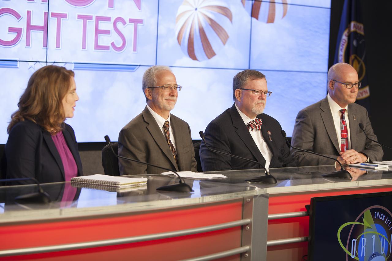 In the Kennedy Space Center’s Press Site auditorium, agency and industry leaders spoke to members of the news media about the postponement of the Orion Flight Test launch due to an issue related to fill and drain valves on the Delta IV Heavy rocket. From left are: Brandi Dean of NASA Public Affairs, Mark Geyer, NASA's Orion program manager, Mike Hawes, Lockheed Martin Orion Program manager, and Dan Collins, United Launch Alliance chief operating officer.