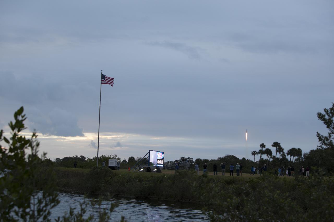A Delta IV Heavy rocket lifts off from Space Launch Complex 37 at Cape Canaveral Air Force Station in Florida carrying NASA's Orion spacecraft on an unpiloted flight test to Earth orbit. In the foreground is the newly upgraded countdown clock at the spaceport's Press Site. Liftoff was at 7:05 a.m. EST. During the two-orbit, four-and-a-half hour mission, engineers will evaluate the systems critical to crew safety, the launch abort system, the heat shield and the parachute system. 