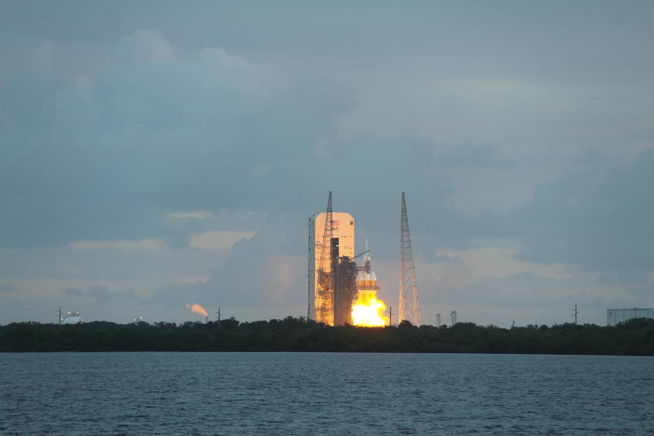 A Delta IV Heavy rocket lifts off from Space Launch Complex 37 at Cape Canaveral Air Force Station in Florida carrying NASA's Orion spacecraft on an unpiloted flight test to Earth orbit. Liftoff was at 7:05 a.m. EST. During the two-orbit, four-and-a-half hour mission, engineers will evaluate the systems critical to crew safety, the launch abort system, the heat shield and the parachute system.
