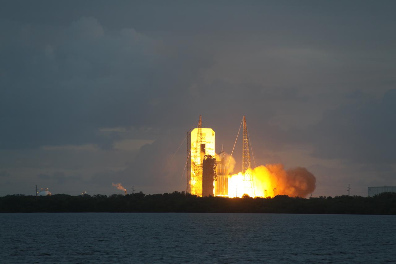 A Delta IV Heavy rocket lifts off from Space Launch Complex 37 at Cape Canaveral Air Force Station in Florida carrying NASA's Orion spacecraft on an unpiloted flight test to Earth orbit. Liftoff was at 7:05 a.m. EST. During the two-orbit, four-and-a-half hour mission, engineers will evaluate the systems critical to crew safety, the launch abort system, the heat shield and the parachute system.