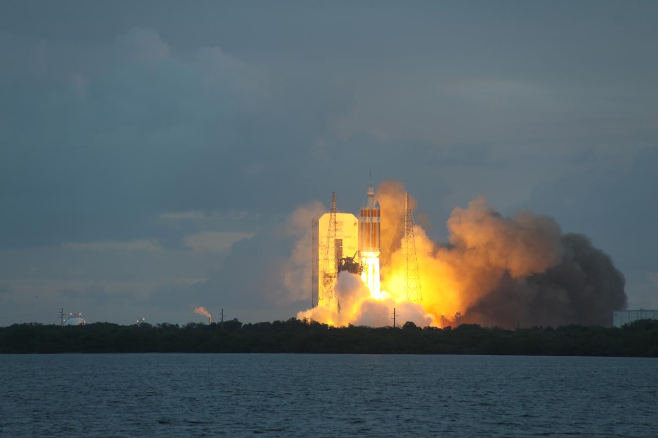 A Delta IV Heavy rocket lifts off from Space Launch Complex 37 at Cape Canaveral Air Force Station in Florida carrying NASA's Orion spacecraft on an unpiloted flight test to Earth orbit. Liftoff was at 7:05 a.m. EST. During the two-orbit, four-and-a-half hour mission, engineers will evaluate the systems critical to crew safety, the launch abort system, the heat shield and the parachute system.