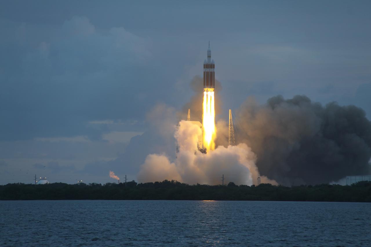 A Delta IV Heavy rocket lifts off from Space Launch Complex 37 at Cape Canaveral Air Force Station in Florida carrying NASA's Orion spacecraft on an unpiloted flight test to Earth orbit. Liftoff was at 7:05 a.m. EST. During the two-orbit, four-and-a-half hour mission, engineers will evaluate the systems critical to crew safety, the launch abort system, the heat shield and the parachute system.