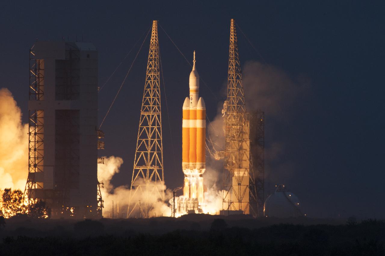 A Delta IV Heavy rocket lifts off from Space Launch Complex 37 at Cape Canaveral Air Force Station in Florida carrying NASA's Orion spacecraft on an unpiloted flight test to Earth orbit. Liftoff was at 7:05 a.m. EST. During the two-orbit, four-and-a-half hour mission, engineers will evaluate the systems critical to crew safety, the launch abort system, the heat shield and the parachute system.