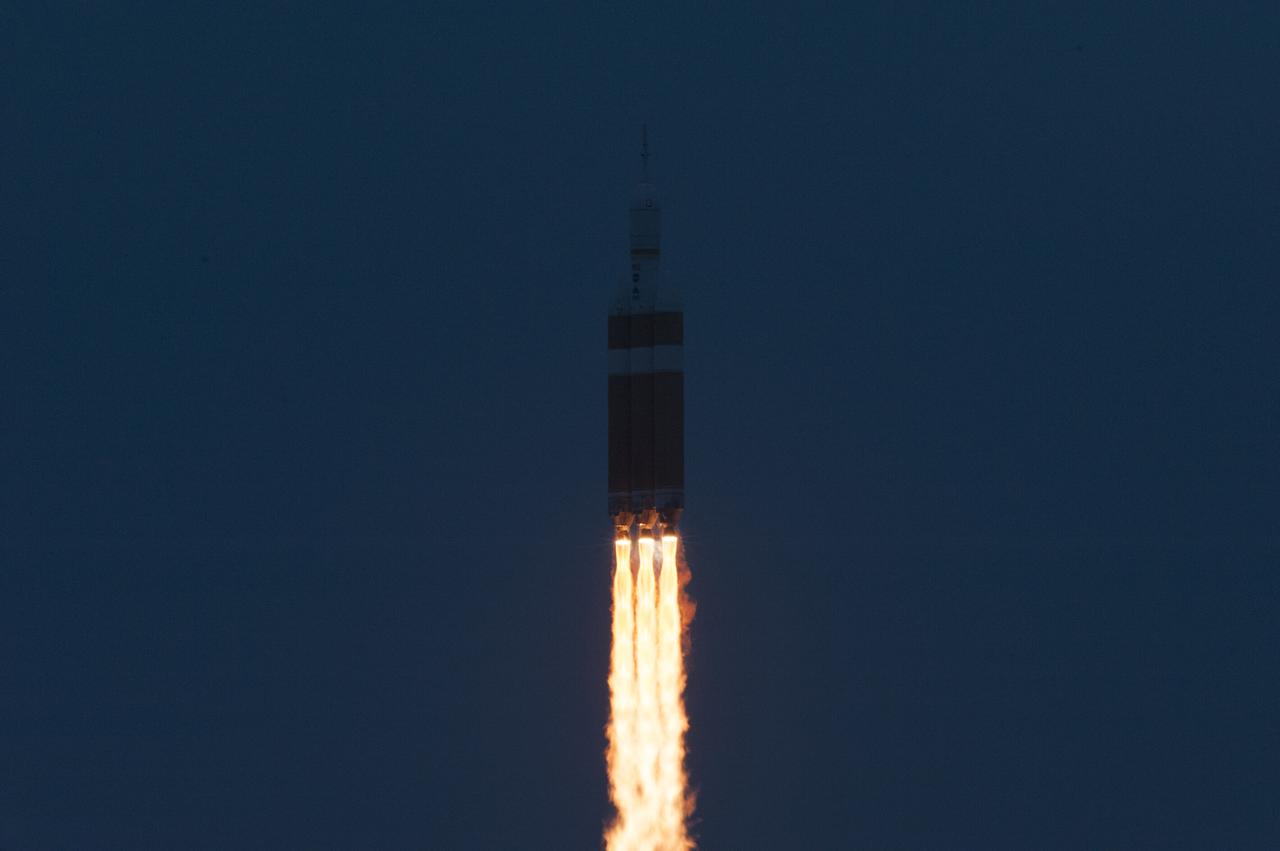 A Delta IV Heavy rocket soars after liftoff from Space Launch Complex 37 at Cape Canaveral Air Force Station in Florida carrying NASA's Orion spacecraft on an unpiloted flight test to Earth orbit. Liftoff was at 7:05 a.m. EST. During the two-orbit, four-and-a-half hour mission, engineers will evaluate the systems critical to crew safety, the launch abort system, the heat shield and the parachute system.