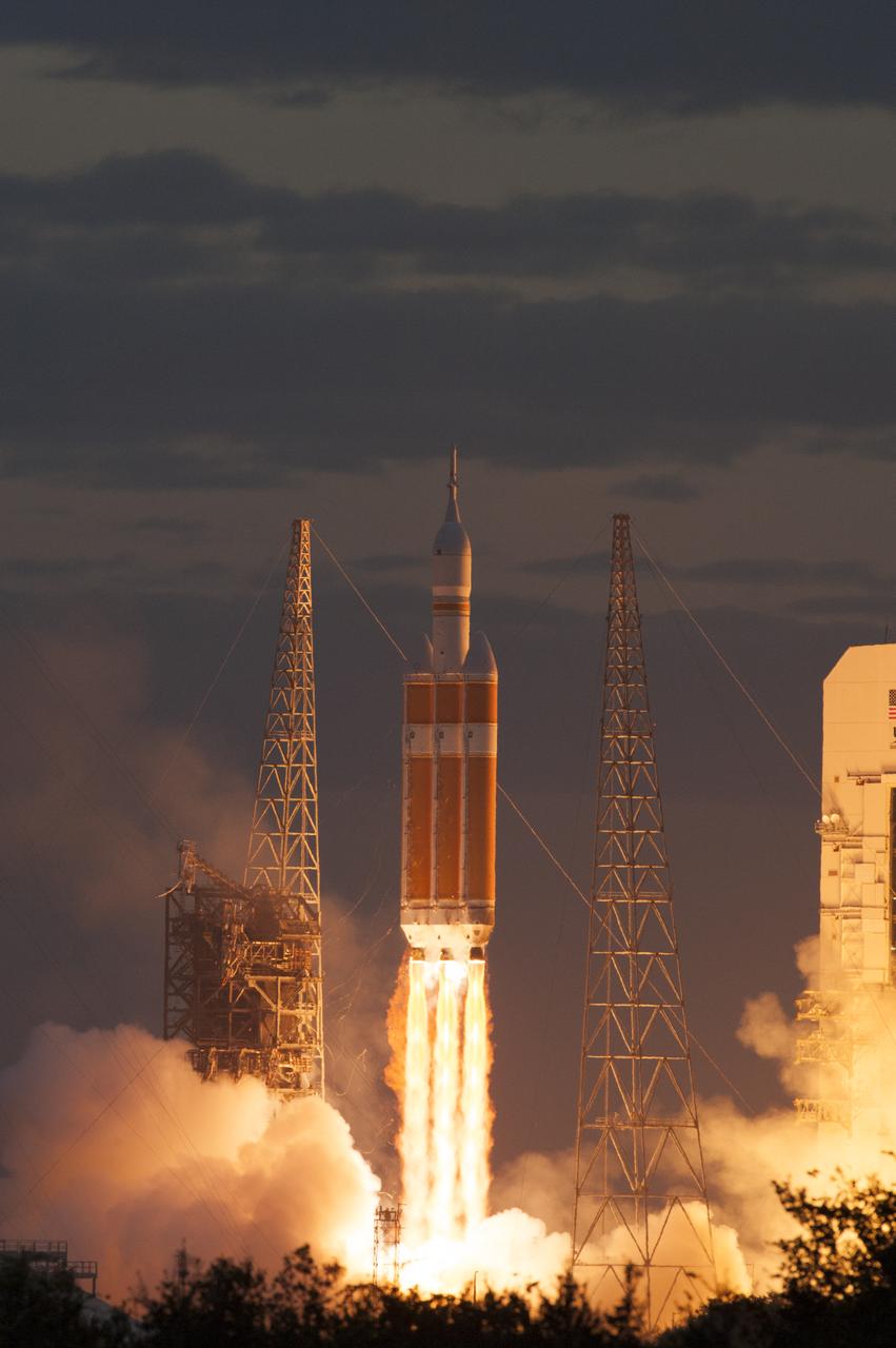 A Delta IV Heavy rocket lifts off from Space Launch Complex 37 at Cape Canaveral Air Force Station in Florida carrying NASA's Orion spacecraft on an unpiloted flight test to Earth orbit. Liftoff was at 7:05 a.m. EST. During the two-orbit, four-and-a-half hour mission, engineers will evaluate the systems critical to crew safety, the launch abort system, the heat shield and the parachute system.