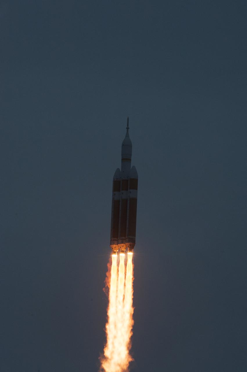 A Delta IV Heavy rocket lifts off from Space Launch Complex 37 at Cape Canaveral Air Force Station in Florida carrying NASA's Orion spacecraft on an unpiloted flight test to Earth orbit. Liftoff was at 7:05 a.m. EST. During the two-orbit, four-and-a-half hour mission, engineers will evaluate the systems critical to crew safety, the launch abort system, the heat shield and the parachute system.