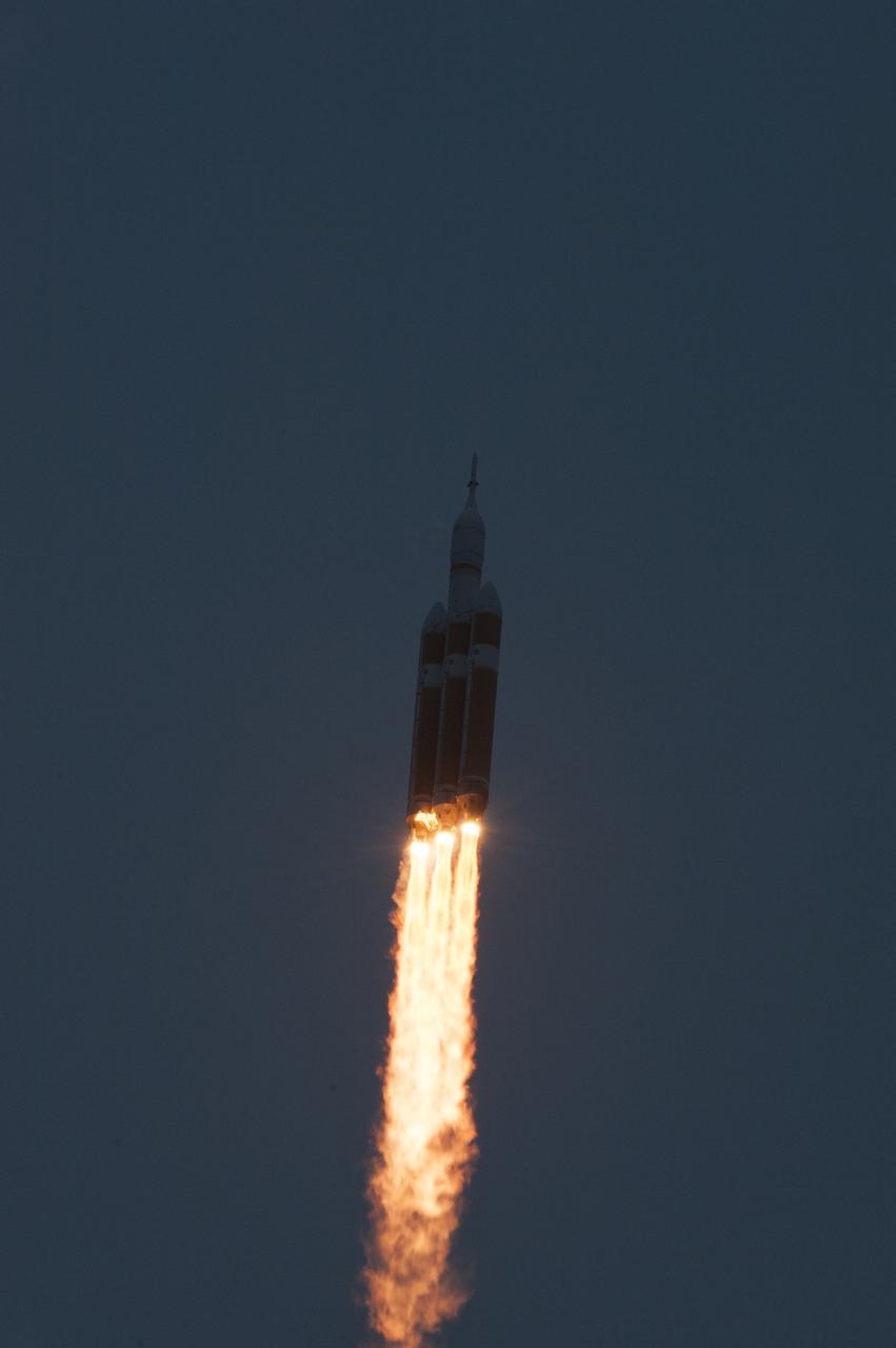A Delta IV Heavy rocket lifts off from Space Launch Complex 37 at Cape Canaveral Air Force Station in Florida carrying NASA's Orion spacecraft on an unpiloted flight test to Earth orbit. Liftoff was at 7:05 a.m. EST. During the two-orbit, four-and-a-half hour mission, engineers will evaluate the systems critical to crew safety, the launch abort system, the heat shield and the parachute system.