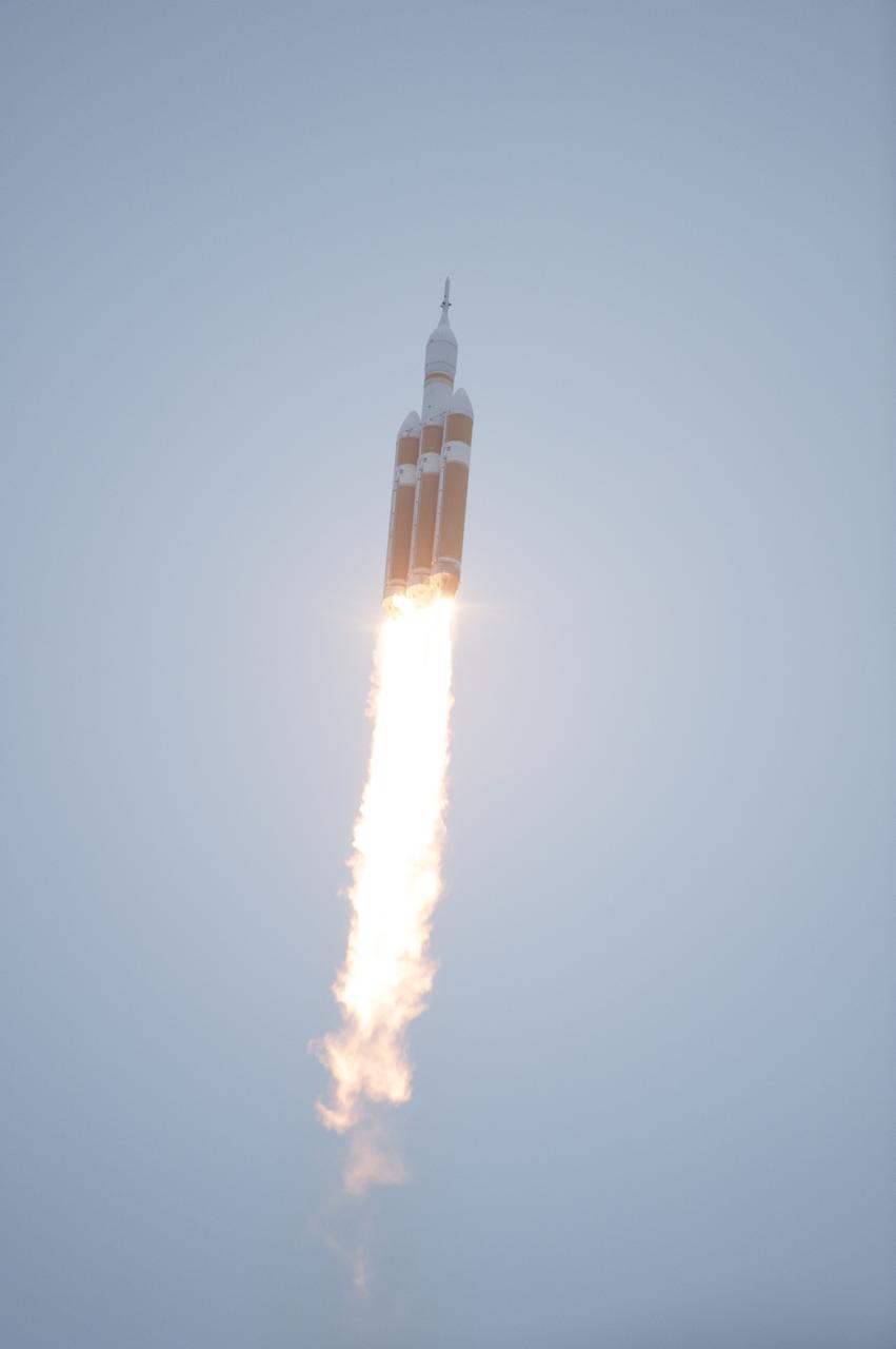 A Delta IV Heavy rocket lifts off from Space Launch Complex 37 at Cape Canaveral Air Force Station in Florida carrying NASA's Orion spacecraft on an unpiloted flight test to Earth orbit. Liftoff was at 7:05 a.m. EST. During the two-orbit, four-and-a-half hour mission, engineers will evaluate the systems critical to crew safety, the launch abort system, the heat shield and the parachute system.