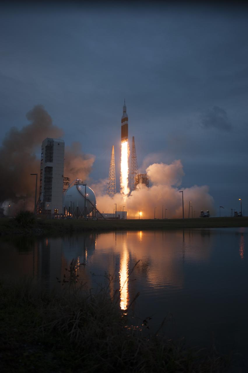 A Delta IV Heavy rocket lifts off from Space Launch Complex 37 at Cape Canaveral Air Force Station in Florida carrying NASA's Orion spacecraft on an unpiloted flight test to Earth orbit. Liftoff was at 7:05 a.m. EST. During the two-orbit, four-and-a-half hour mission, engineers will evaluate the systems critical to crew safety, the launch abort system, the heat shield and the parachute system.