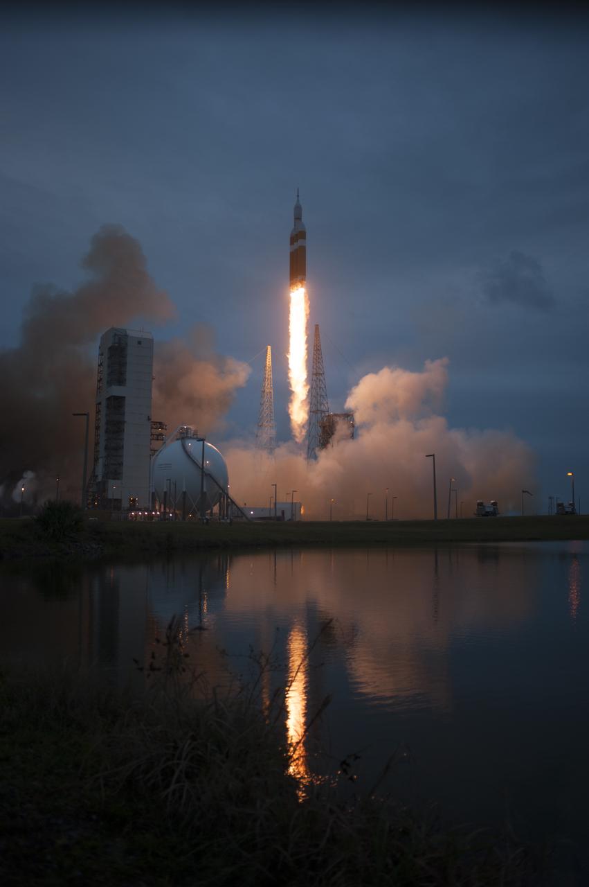 A Delta IV Heavy rocket lifts off from Space Launch Complex 37 at Cape Canaveral Air Force Station in Florida carrying NASA's Orion spacecraft on an unpiloted flight test to Earth orbit. Liftoff was at 7:05 a.m. EST. During the two-orbit, four-and-a-half hour mission, engineers will evaluate the systems critical to crew safety, the launch abort system, the heat shield and the parachute system.