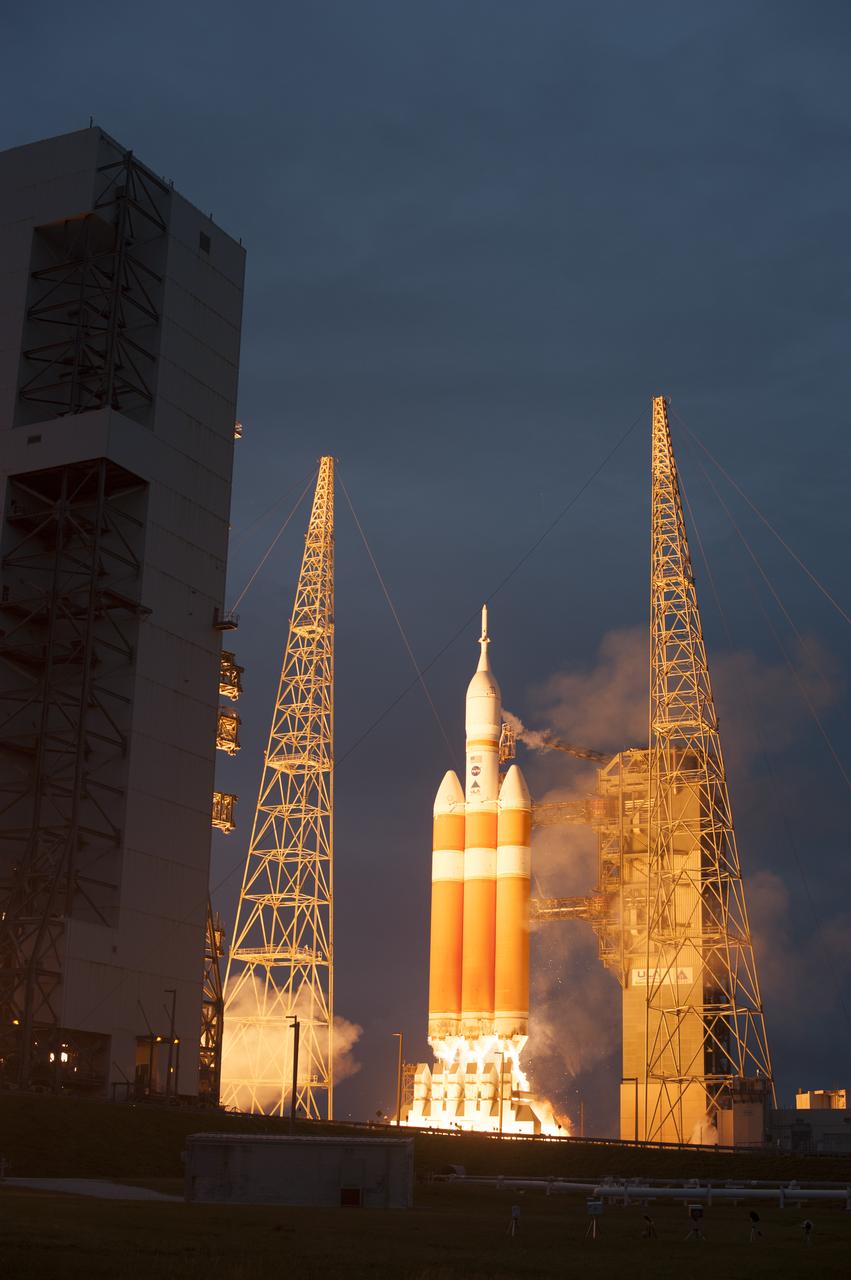 A Delta IV Heavy rocket lifts off from Space Launch Complex 37 at Cape Canaveral Air Force Station in Florida carrying NASA's Orion spacecraft on an unpiloted flight test to Earth orbit. Liftoff was at 7:05 a.m. EST. During the two-orbit, four-and-a-half hour mission, engineers will evaluate the systems critical to crew safety, the launch abort system, the heat shield and the parachute system.