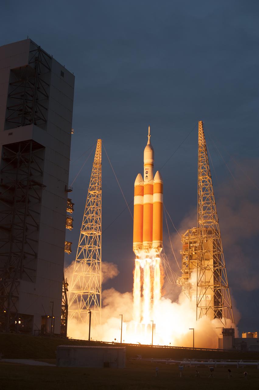 A Delta IV Heavy rocket lifts off from Space Launch Complex 37 at Cape Canaveral Air Force Station in Florida carrying NASA's Orion spacecraft on an unpiloted flight test to Earth orbit. Liftoff was at 7:05 a.m. EST. During the two-orbit, four-and-a-half hour mission, engineers will evaluate the systems critical to crew safety, the launch abort system, the heat shield and the parachute system.