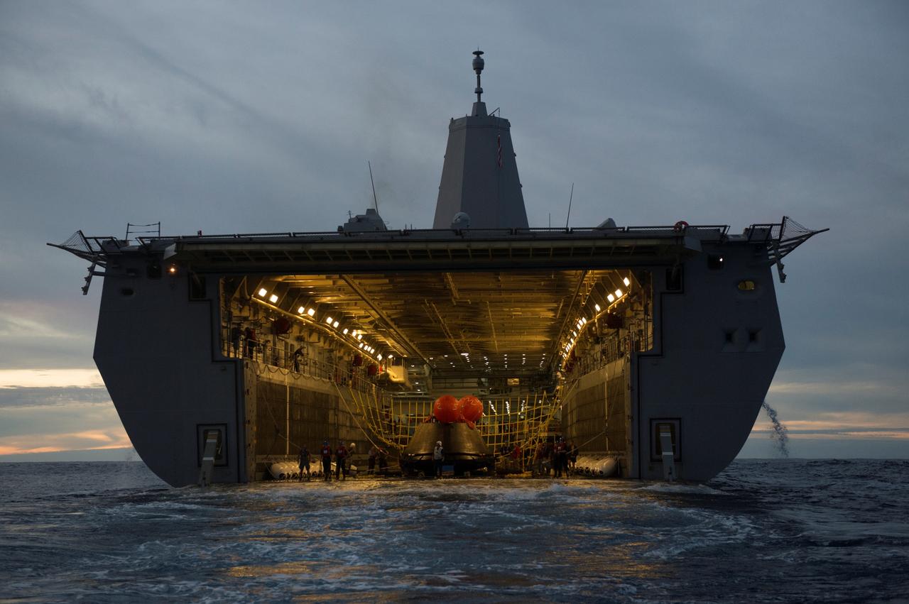The Orion crew module is recovered after splashdown in the Pacific Ocean about 600 miles off the coast of San Diego, California. NASA, the U.S. Navy and Lockheed Martin coordinated efforts to recover Orion and secure the spacecraft inside the well deck of the USS Anchorage. After lifting off at 7:05 a.m. EST atop a Delta IV Heavy rocket from Space Launch Complex 37 at Cape Canaveral Air Force Station in Florida, NASA's Orion spacecraft completed a two-orbit, four-and-a-half hour mission to test systems critical to crew safety, including the launch abort system, the heat shield and the parachute system. The Ground Systems Development and Operations Program is leading the recovery efforts. 