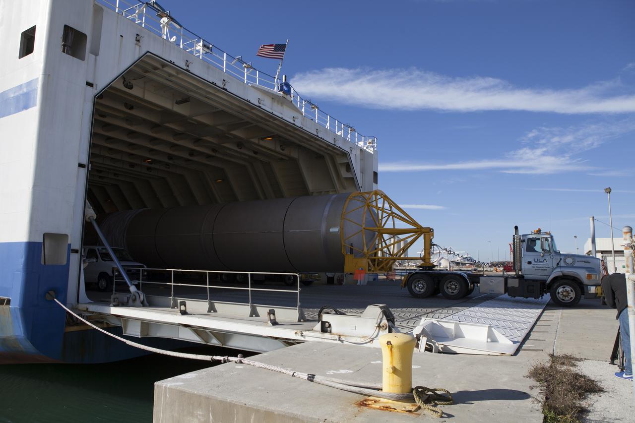 A truck begins to transport the Atlas V booster stage from the United Launch Alliance Delta Mariner. The rocket will be used to launch NASA's Magnetospheric Multiscale mission.