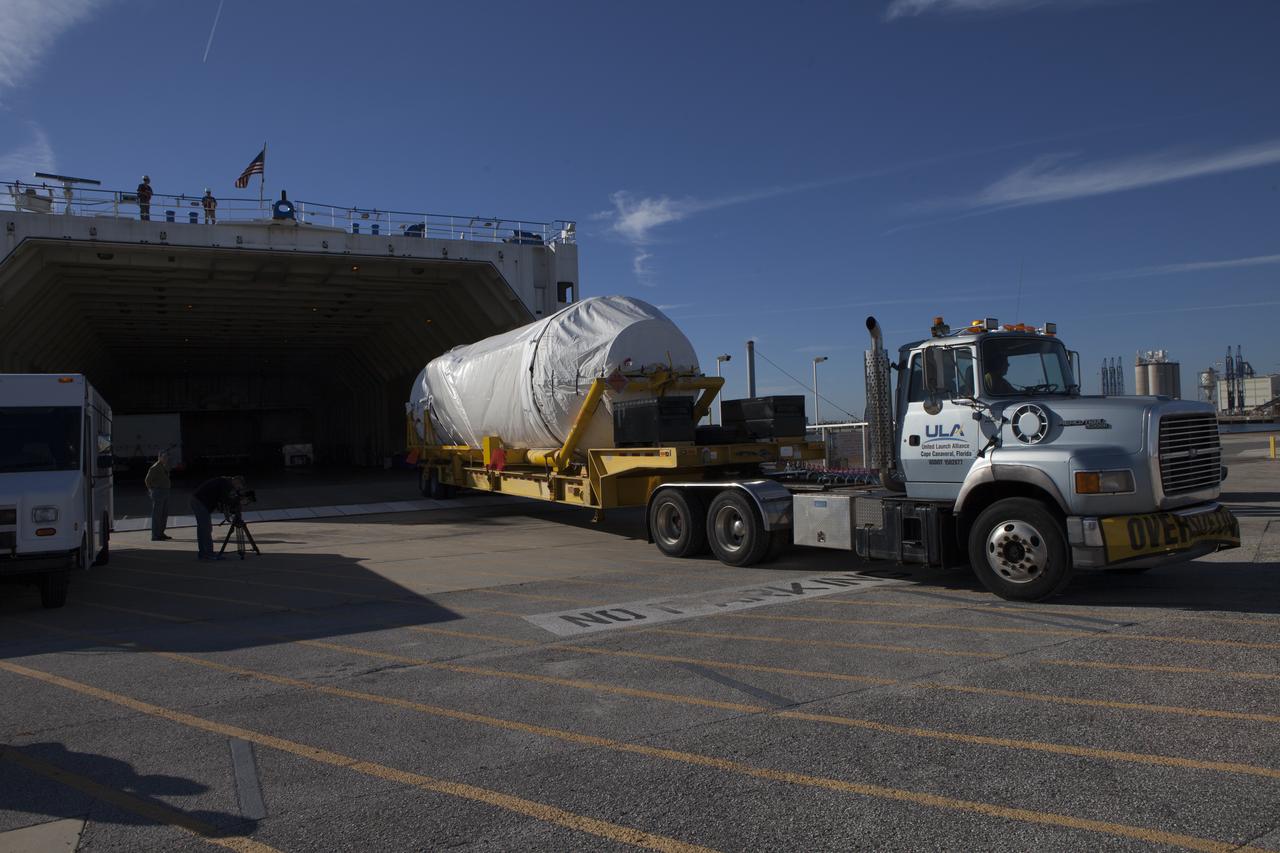 A truck begins to transport a Centaur upper stage from the United Launch Alliance Delta Mariner to the Atlas V Spaceflight Operations Center at Cape Canaveral Air Force Station. The rocket will be used to launch NASA's Magnetospheric Multiscale mission. 
