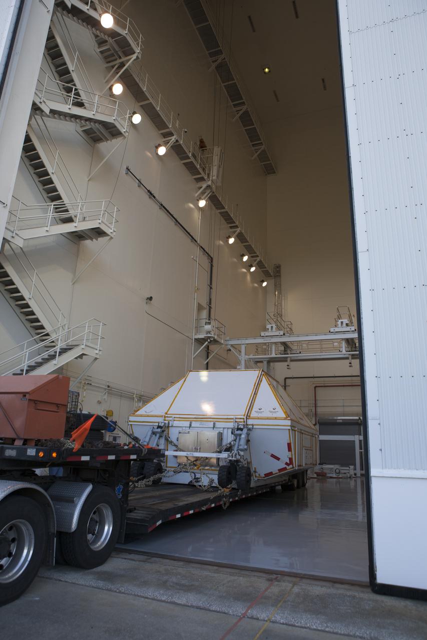 NASA's Orion spacecraft arrives at the Launch Abort System Facility at Kennedy Space Center in Florida. The spacecraft was transported 2,700 miles overland from Naval Base San Diego in California, on a flatbed truck secured in its crew module transportation fixture for the trip. During its first flight test, Orion completed a two-orbit, four-and-a-half hour mission Dec. 5 to test systems critical to crew safety, including the launch abort system, the heat shield and the parachute system. The Ground Systems Development and Operations Program led the recovery, offload and transportation efforts.