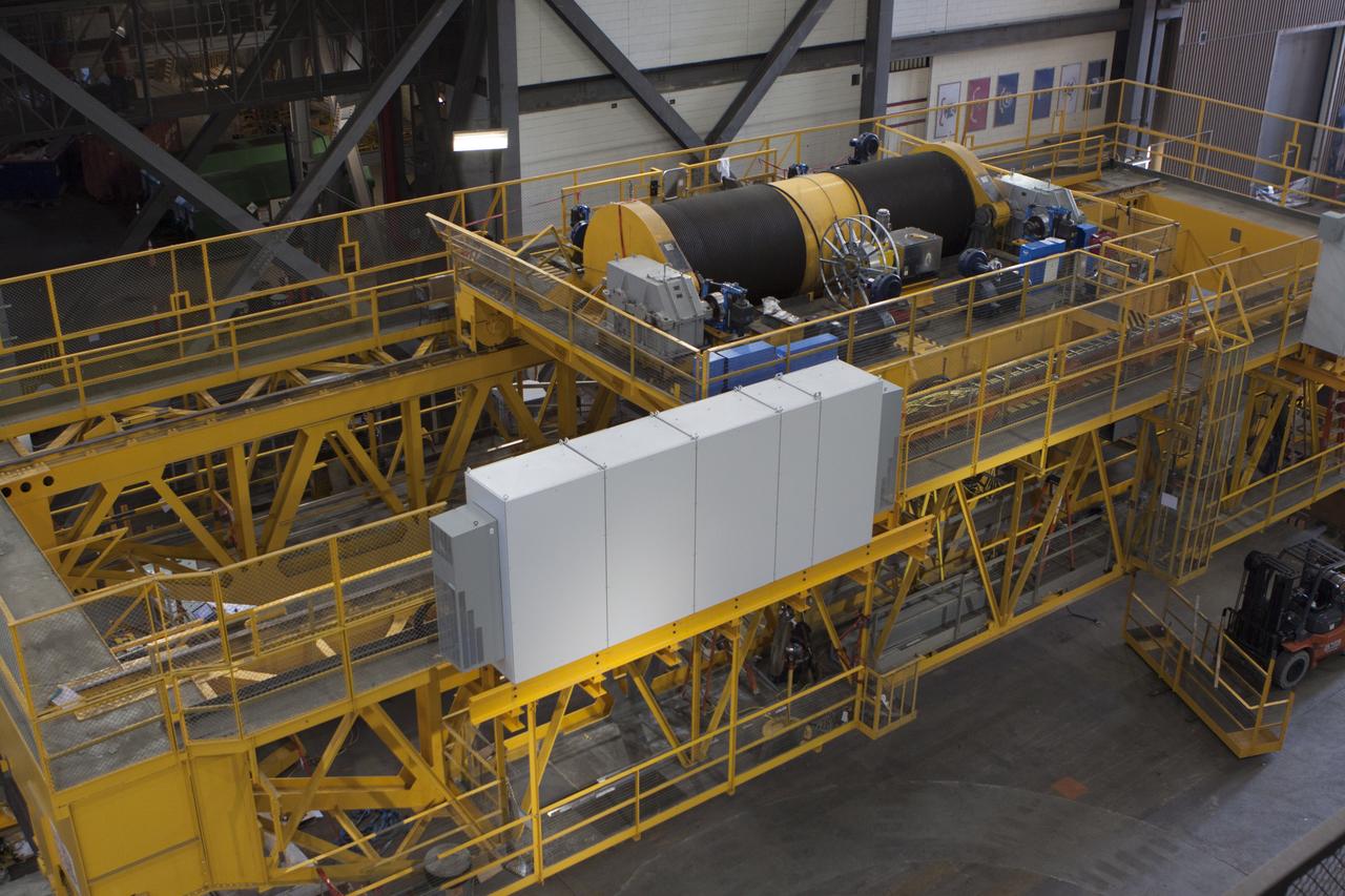 A view from above inside the Vehicle Assembly Building at NASA's Kennedy Space Center in Florida, shows the 175-ton crane on the ground floor of the transfer aisle. The crane's 45-year-old controls are being upgraded to improve reliability, precision and safety. The Ground Systems Development and Operations Program is overseeing upgrades and modifications to the crane so that it can support lifting needs for NASA and other exploration vehicles, including the agency's Space Launch System and Orion spacecraft.