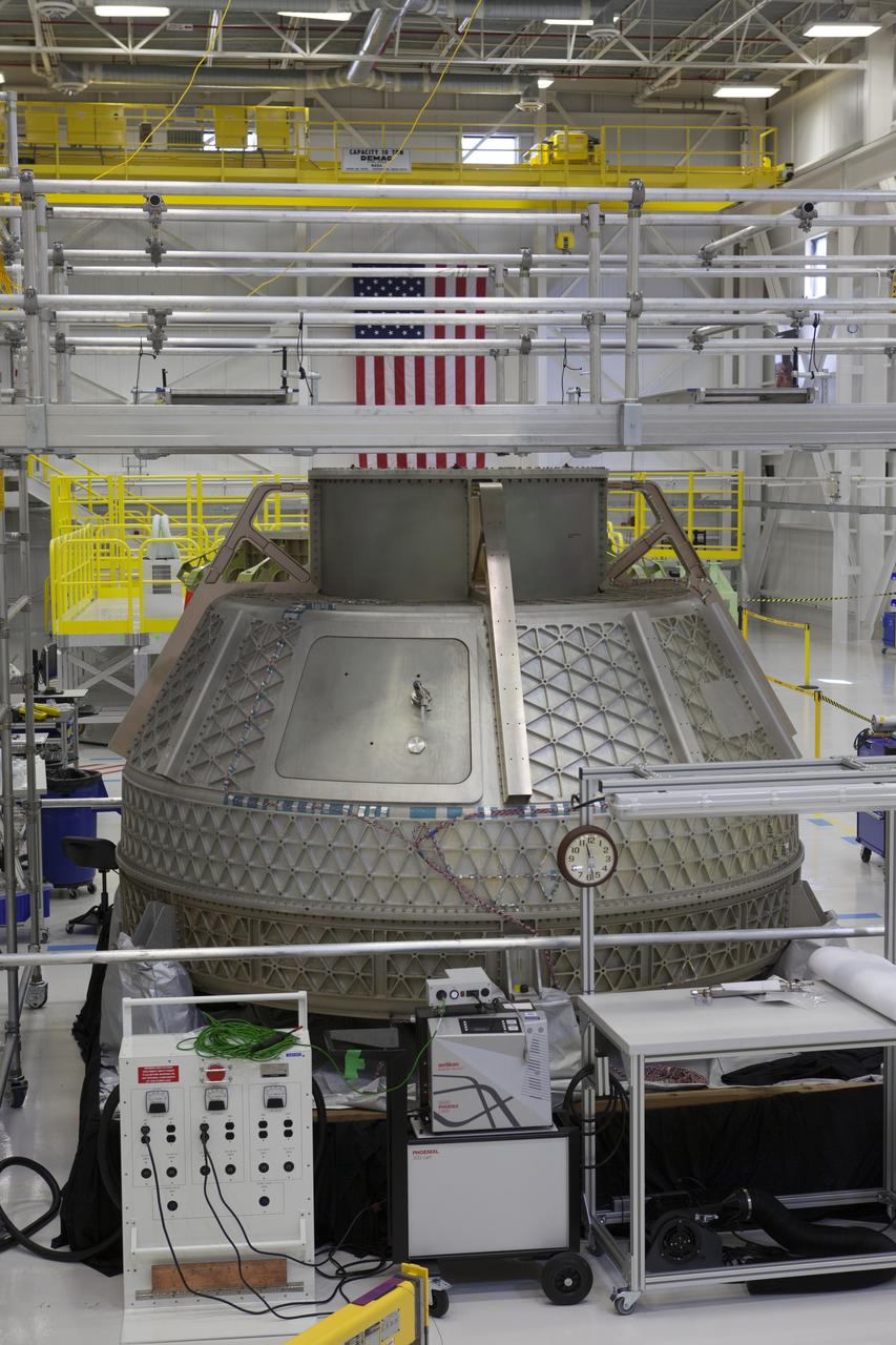 The Boeing CST-100 Structural Test Article awaits testing inside the Commercial Crew and Cargo Processing Facility, or C3PF, at NASA’s Kennedy Space Center in Florida. The test article will serve as a pathfinder for assembling and processing operational CST-100 spacecraft inside the revitalized facility, which for 20 years served as a shuttle processing hangar.